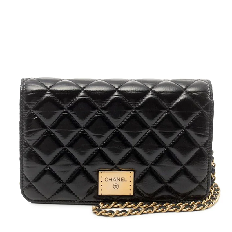 Chanel Quilted Leather Shoulder Bag for FashionistasBlack Chanel Quilted Calfskin Logo Plate Wallet On Chain Crossbody Bag