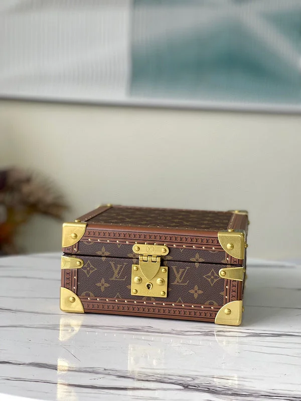 Louis Vuitton bags with a snap - button closure and a decorative charm for styleBC - LOUIS VUITTON BAGS - 5751