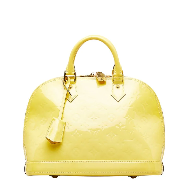 Louis Vuitton Twist bags with the iconic LV - turnlock closureLouis Vuitton Monogram Verni Alma PM Handbag M90101 Citrine Yellow