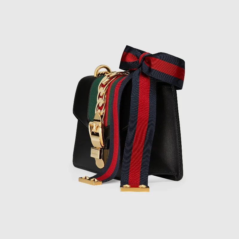 Women Gucci Sylvie bags featuring the signature web stripeGucci SyLouis Vuittonie Leather Mini Chain Bag Black