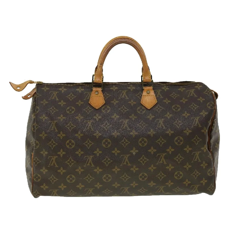 Louis Vuitton Twist bags with the iconic LV - turnlock closureLouis Vuitton Brown Canvas Speedy 40 handbag bag