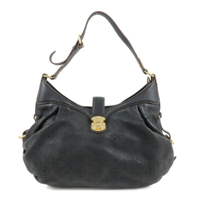 Louis Vuitton Twist bags with the iconic LV - turnlock closureLouis Vuitton Monogram Mahina XS Shoulder Bag Black M95660