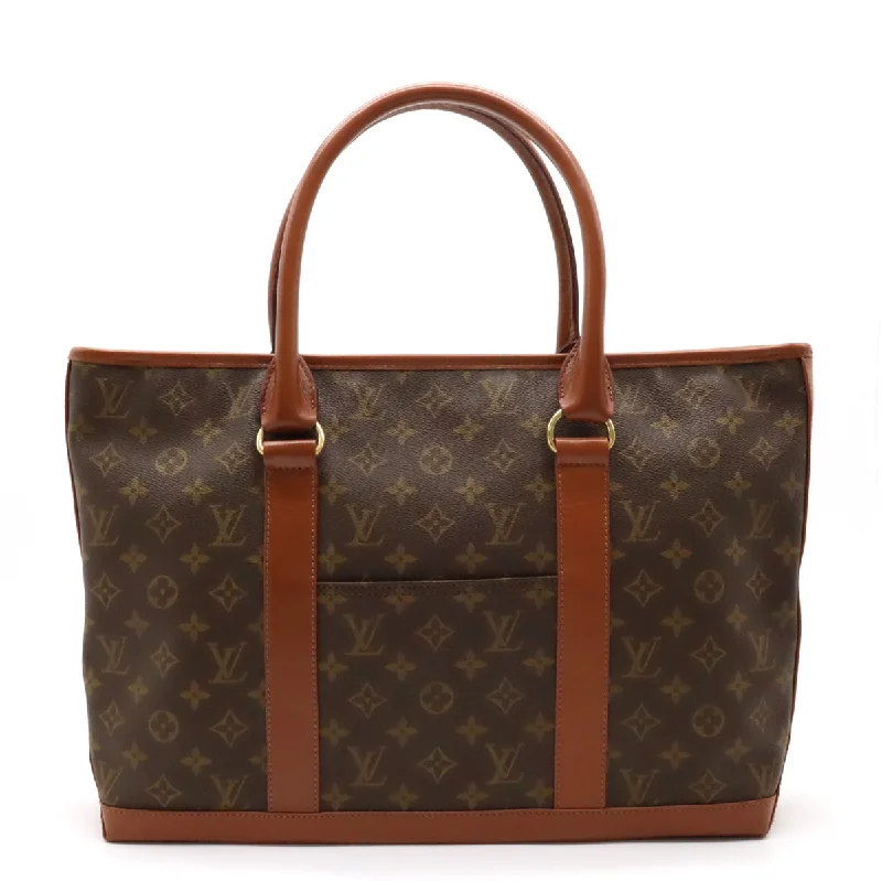 Louis Vuitton bags with a snap - button closure and a decorative charm for styleLouis Vuitton Monogram Weekend PM Tote Bag M42425