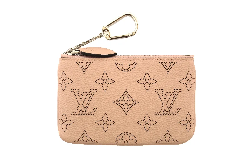 Louis Vuitton Twist bags with the iconic LV - turnlock closureAuthentic NEW Louis Vuitton Magnolia Mahina Calf Leather Key Pouch