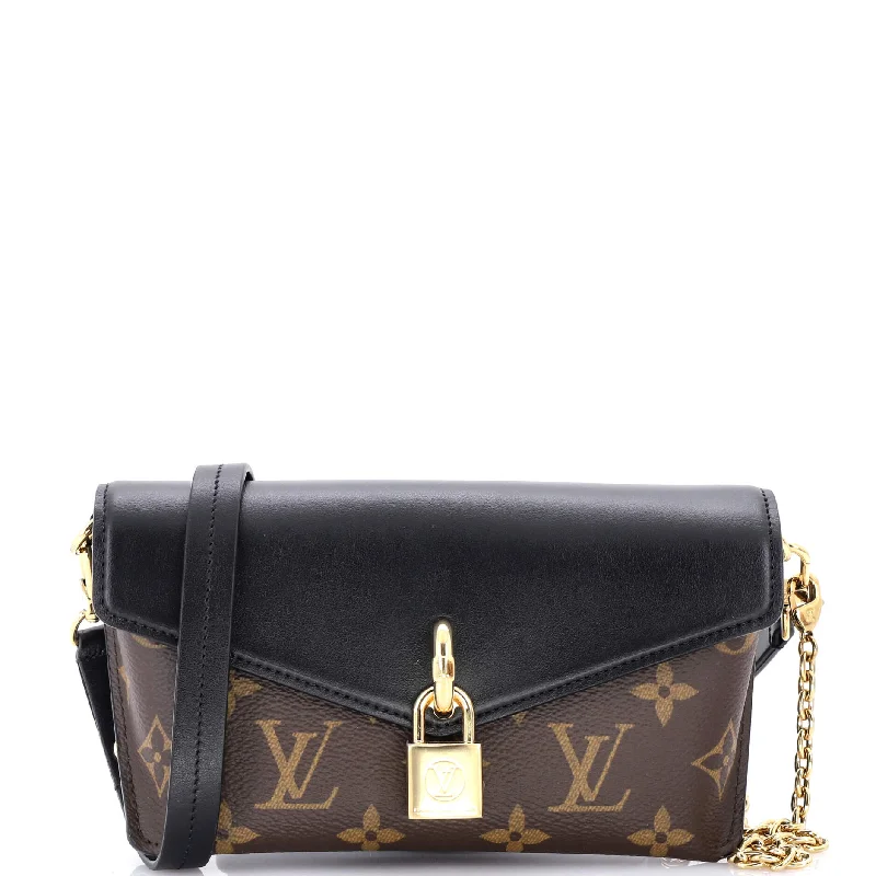 Louis Vuitton Twist bags with a crystal - embellished LV - turnlockPadlock on Strap Handbag Monogram Canvas and Leather