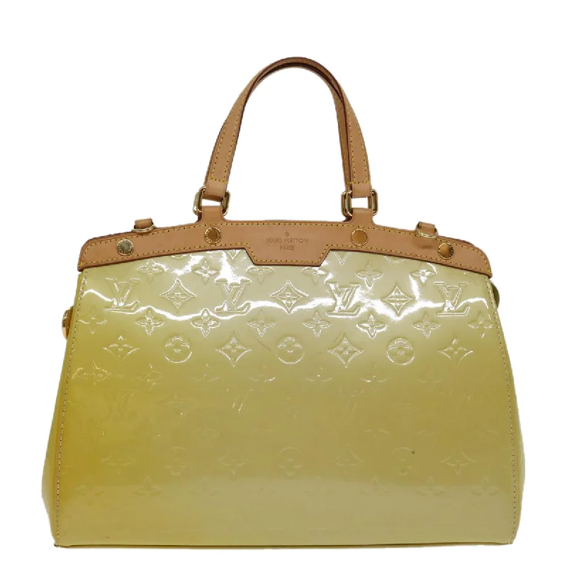 Louis Vuitton bags with a chain - link trim and a leather body for a modern edgeLOUIS VUITTON Blair Handbag