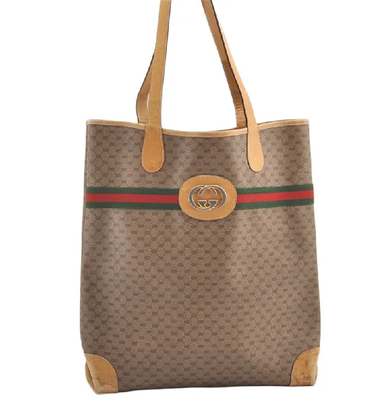 Women Gucci bags with a snap - button closure and a decorative charmAuthentic GUCCI Web Sherry Line Micro GG PVC Leather Tote Bag Brown 0638K