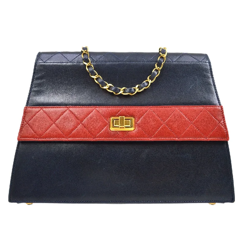 Chanel Quilted Leather Shoulder Bag for FashionistasChanel 1989-1991 Navy Trapezoid Flap Large & Pouch Set