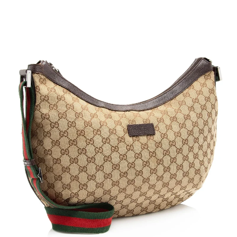 Ladies Gucci shoulder bags with a wide - width strapGucci GG Canvas Half Moon Medium Messenger (JzXzNp)