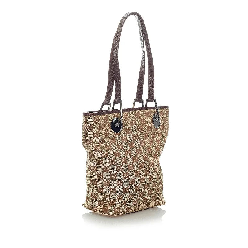 Gucci Marmont bags for women with gold - toned hardwareGucci GG Canvas Eclipse Tote Bag (32948)