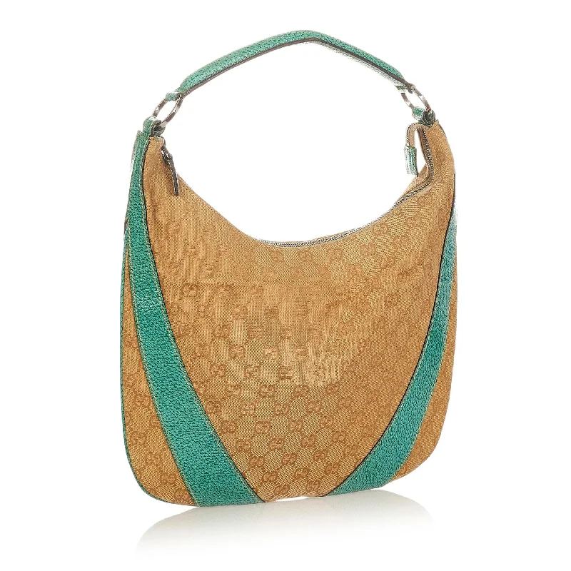 Women Gucci Sylvie bags with a monogram - embossed leatherGucci GG Canvas Shoulder Bag (SHG-lRiQLU)