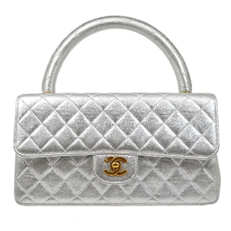 Chanel Quilted Leather Shoulder Bag for FashionistasCHANEL 1994 Silver Lambskin Quilted Top Handle Bag