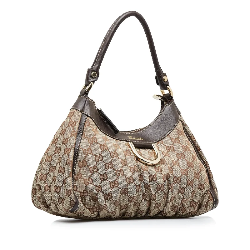 Gucci tote bags for women with a printed Gucci logoGucci GG Canvas Abbey D-Ring Handbag (SHG-GBqf3P)