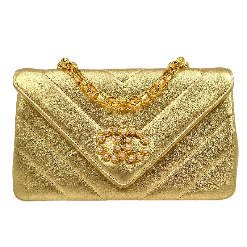 Chanel Colorful Handbag for Spring OutfitsCHANEL 1991-1994 Gold Lambskin Chevron Faux Pearl CC Flap Bag